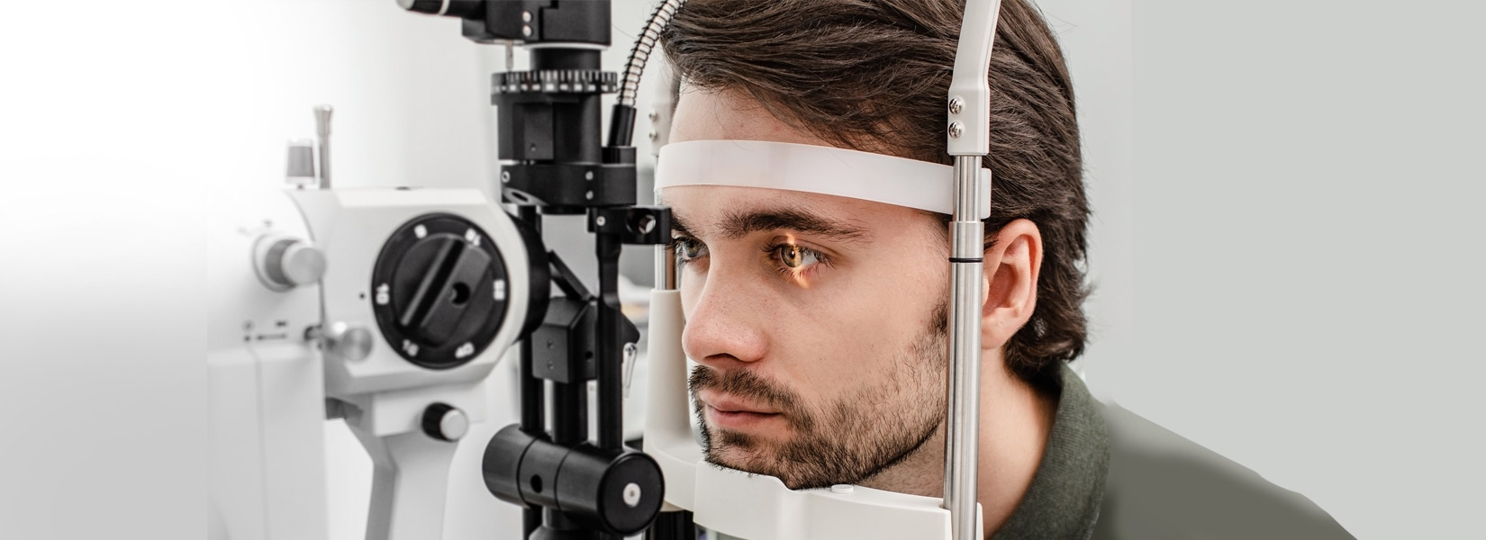 young man during eye exam in Alexandria